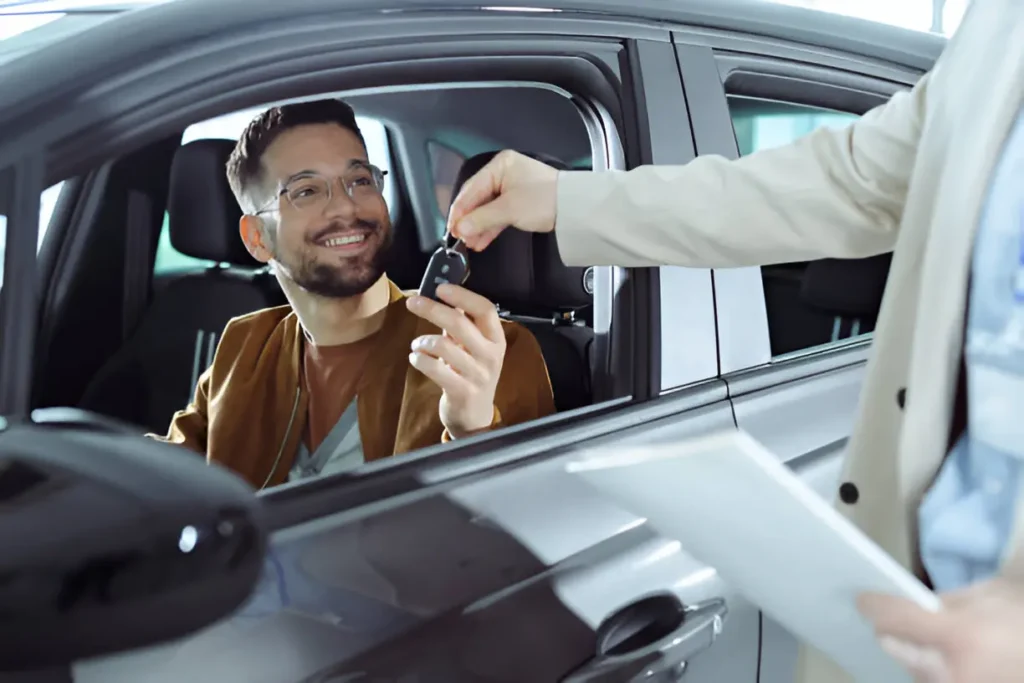 Nixa, MO 11 Local locksmith in Nixa unlocking a vehicle during roadside emergency